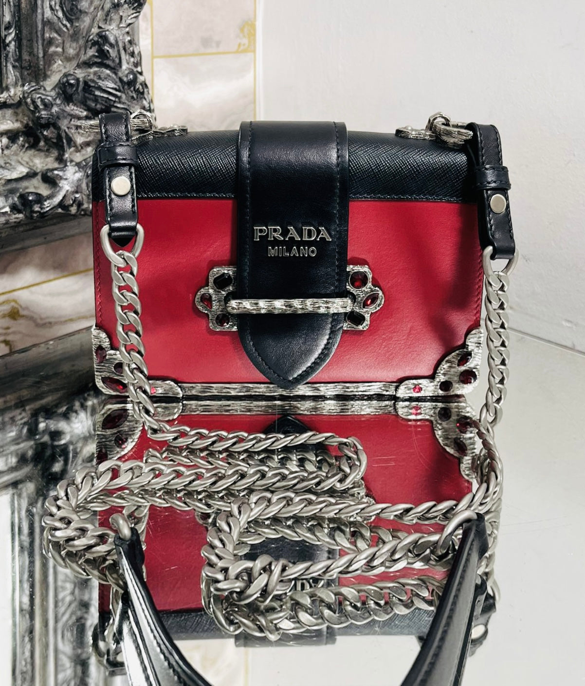 Prada cashier sale